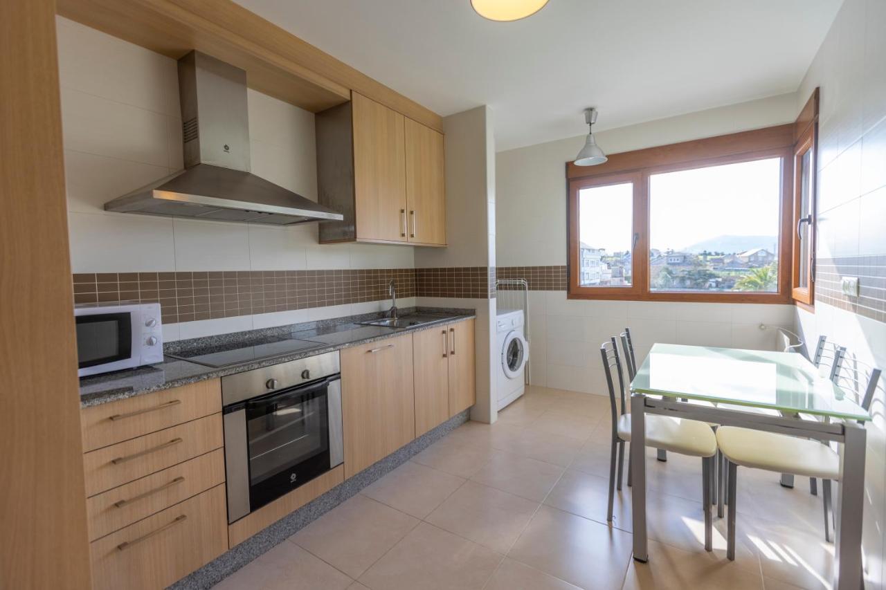 Apartagal-Playa De Llas, Foz Esterno foto